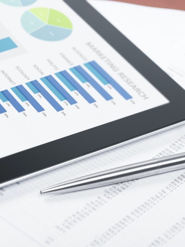 Business Charts on Digital Tablet