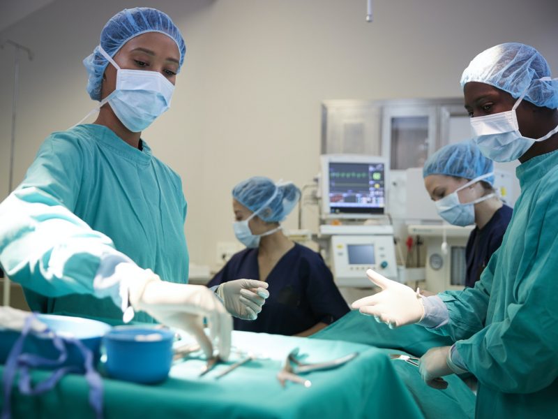 Surgical Team Working On Patient In Hospital Operating Theatre